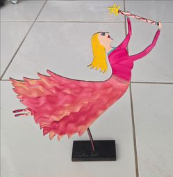 Signed Claudine Buell Whimsical Hand‑Painted Steel Fairy Sculpture
Hand‑painted steel fairy sculpture, artist signed Claudine Buell, original label on