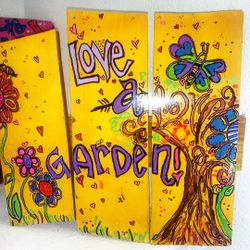 Upcycled fence into Gatden sign