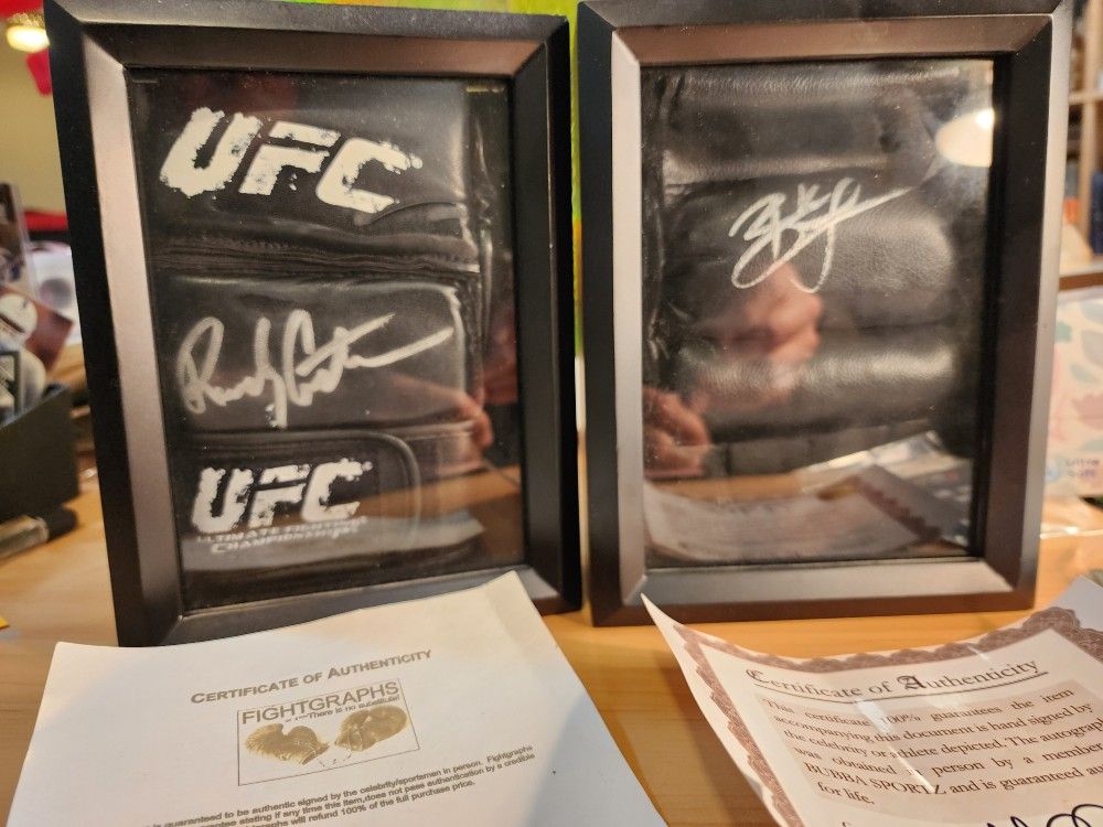 Brock Lesnar & Randy Couture autographed gloves w/Coa and shadow box frames
