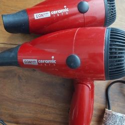 Two Conair hairdryers