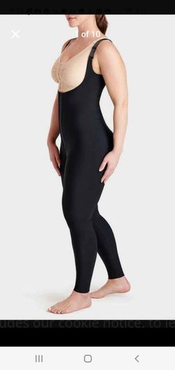 Body shaper for complete in excellent condition  used once mayne just tried on its a 2x but more like a xl has the the under opening for easy access t
