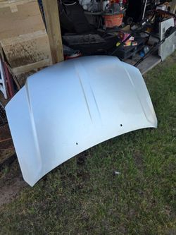 Dodge grand caravan hood silver