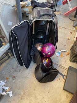 3 bowling balls with case