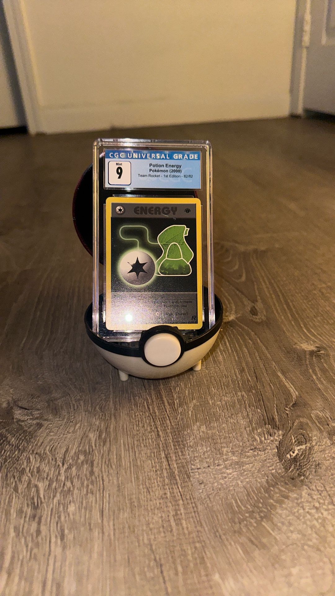 Pokemon Team Rocket-1st Edition Graded 9 Potion Energy Card(card Only Ball Not Included)