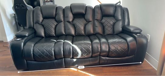 Leather reclining sofa with single recliner