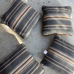 4 piece outdoor patio furniture cushions in gray/orange stripes (made by sunbrella)  Located in concord  Good condition  No damages/rips Measures 17” 