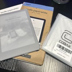 Amazon Kindle 12th Gen Black Kindle Paperwhite, NEW with original box, manual, case and charger. 