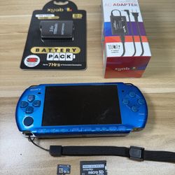 PSP 3000 with 100 games installed                      A91