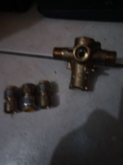 Four-way brass shower installer and three shark bites all new never used more track bites are available if you need them.