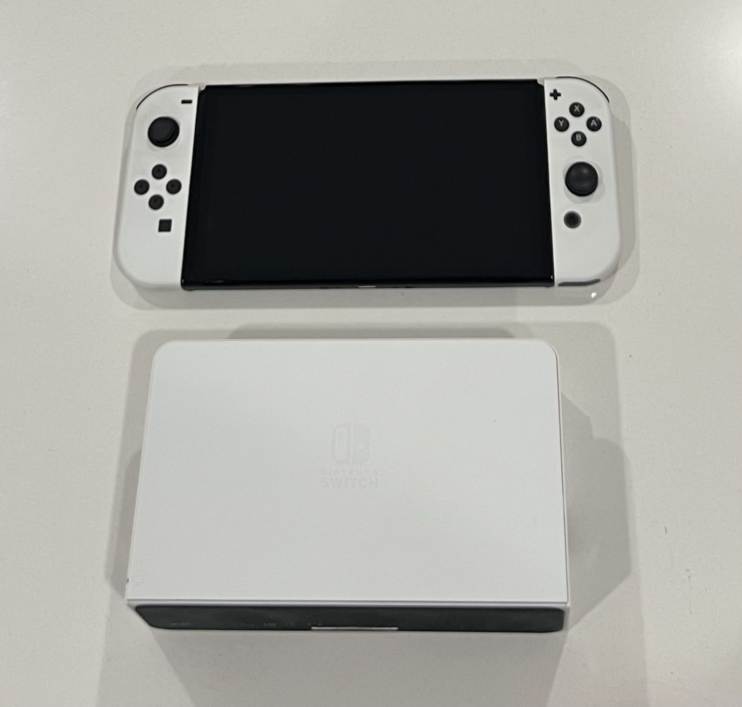 Nintendo Switch OLED with dock, HDMI cable & power cable in great condition. $250