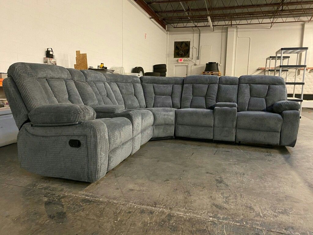 Grey fabric u-shape reclining theatre sectional w/cup holders