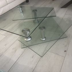 Glass table swivels