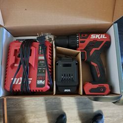 SKIL Dril With Battery And Charger.   