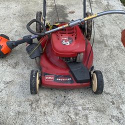 Toro Lawnmower and  Husqvarna Weed Cutting 