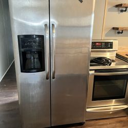 Frigidaire Refrigerator And Lg Stainless Steal  Stove