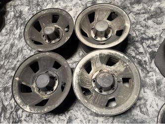 Ford F150 or Bronco 15 inch stock steel rims and center caps. 5 on 5.5