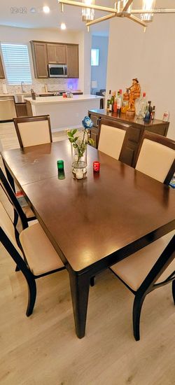 8-Piece Espresso Dining Set: Table with Leaf, 6 Chairs, & Matching Wine Buffet