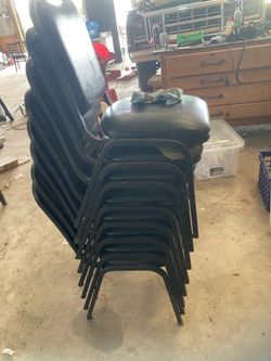 Eight stackable chairs