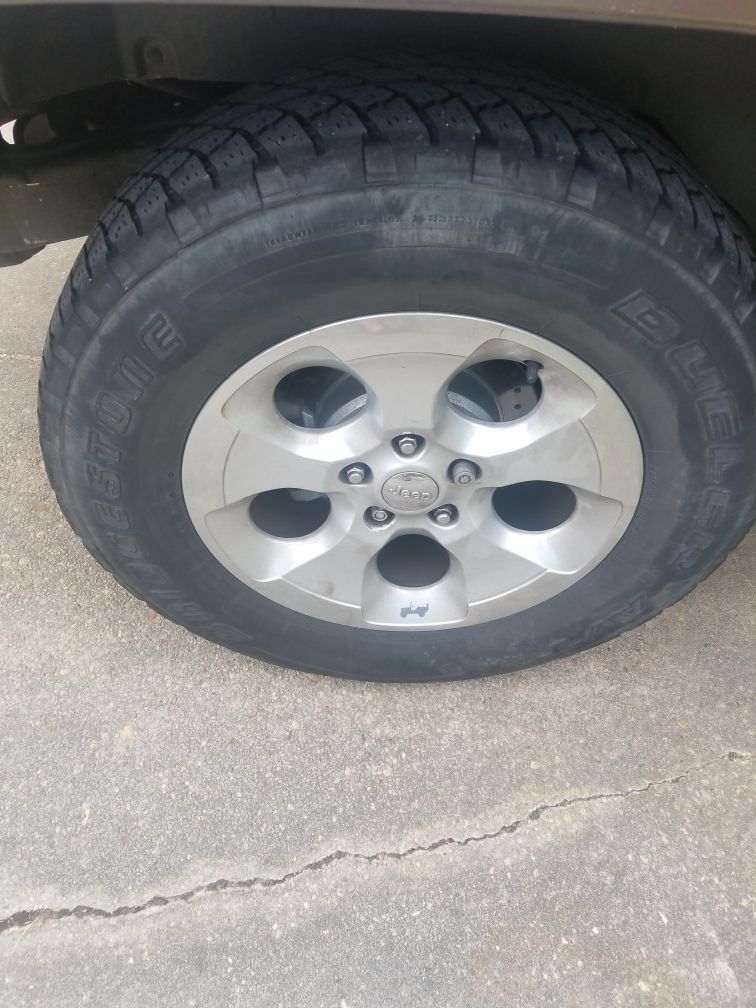 5 18's jeep rims and tires