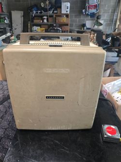 60's Reel to Reel player with microphone.  Everything still works.