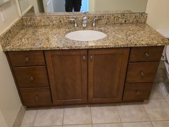 Vanity 60". Granite Countertop and fixtures available.