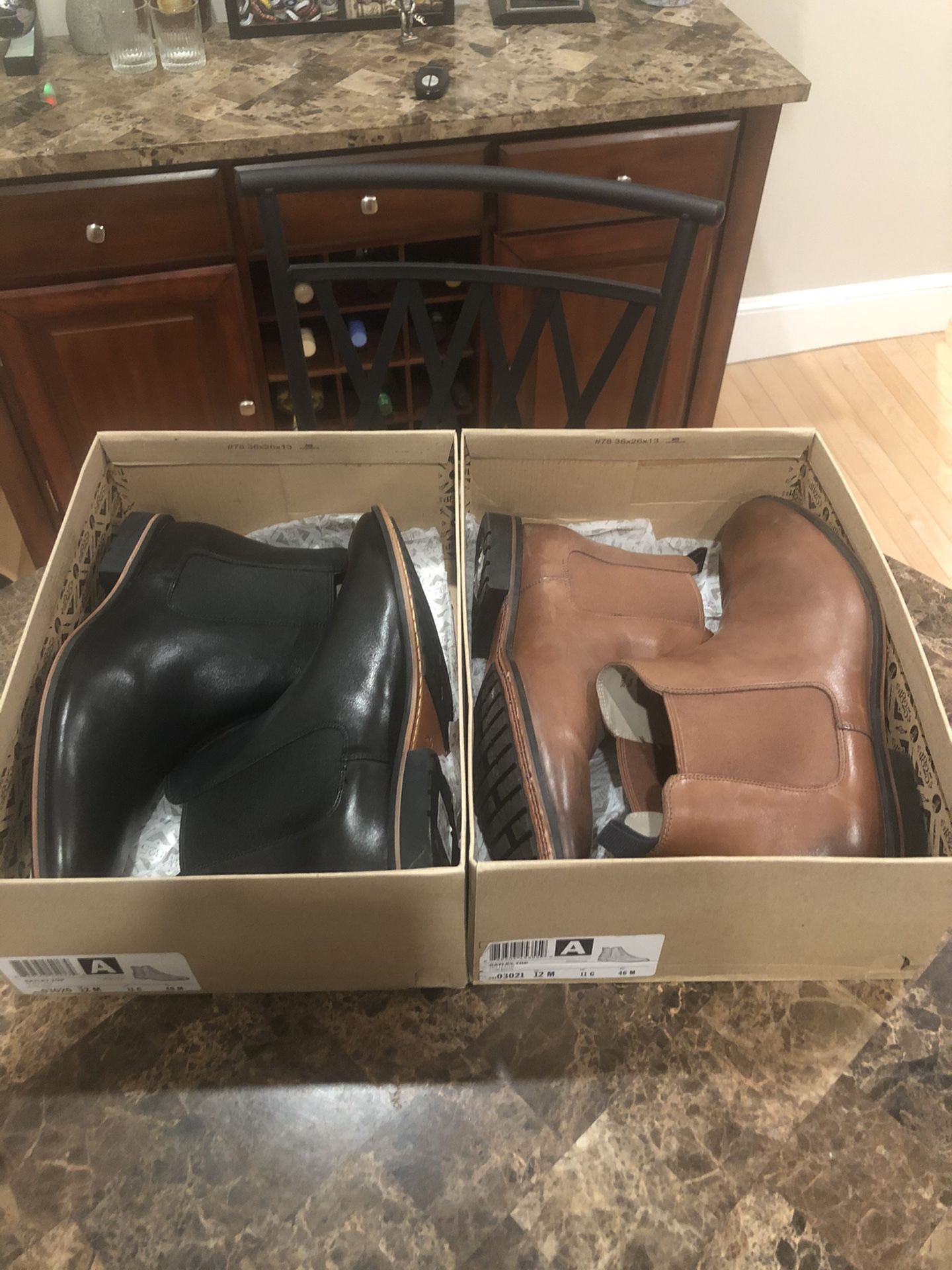 Brown and black Clark’s Chelsea boots, in great condition. $90 for both, price is negotiable.size 12