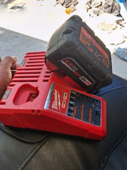 Milwaukee battery charger and battery