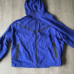 Blue Woven Nike Tech (windbreaker)