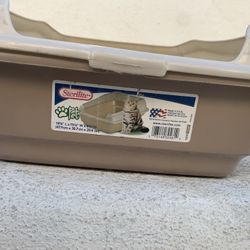 Litter box With Raised Guard