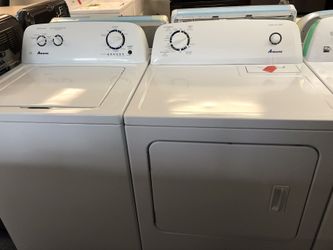 Used Amana High Efficiency washer and dryer set. 1 year warranty
