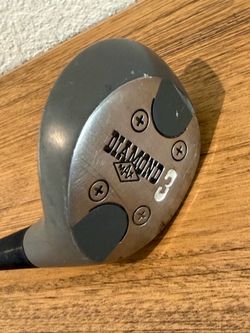 Diamond 3 wood club head. Metal face with black traction pads. Clear stamped Diamond logo and number 3. Classic gray and black finish. Diamond Max 3 g