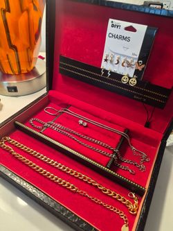 3 chain necklaces, pair of diamond stud earrings, 10 charms
