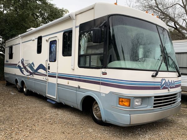 1998 dolphin 37ft class,a 2/ac awening w/slide out sleeps,6 self cont nice