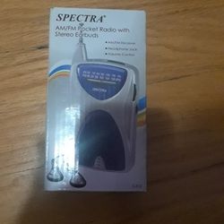 Spectra, Am,fm Radio W. Earbuds.