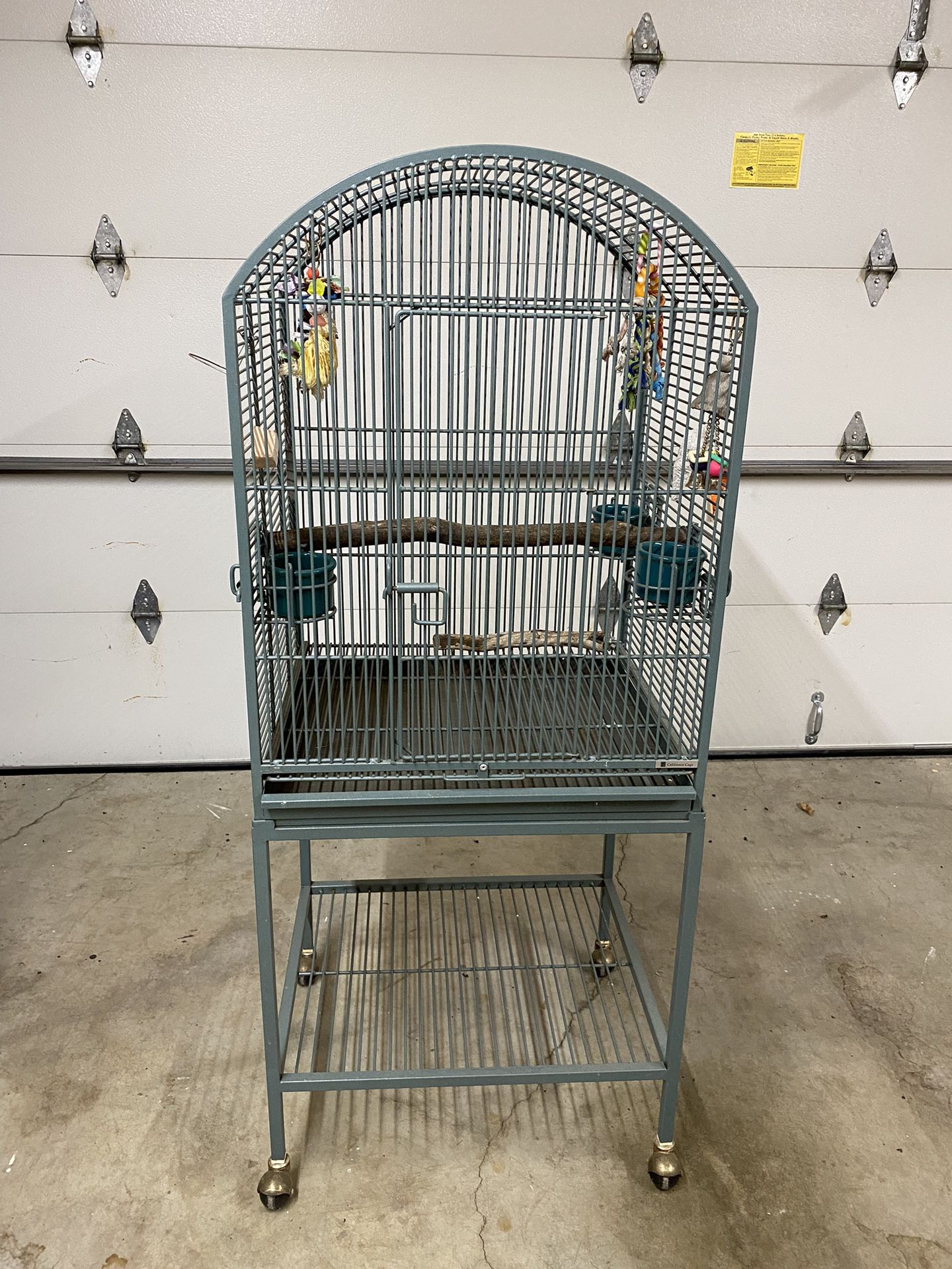 California Bird Cage With Spars And Food And Water Dishes.  Asking $250.00
