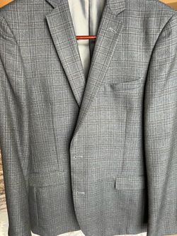 Men’s sport coat, black and blue plaid, size 44L