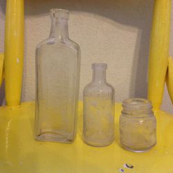 Set of Three-Vintage Vaseline, Fig Syrup, and Listerine glass bottles