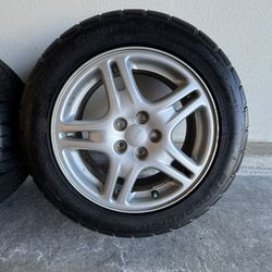 Set of 4 Newer BF Goodrich G-force Comp tires w/ 2003 OEM Subaru WRX wheels