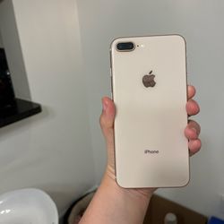 baby pink iPhone 8 Plus with cracked front screen and comes with sim port opener