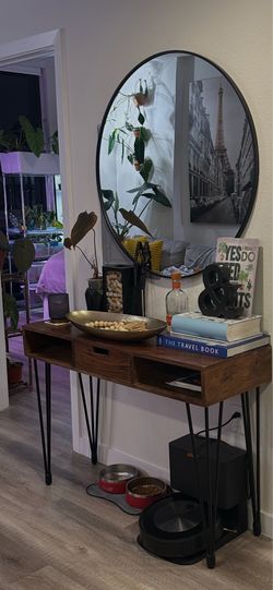 Console table and round mirror