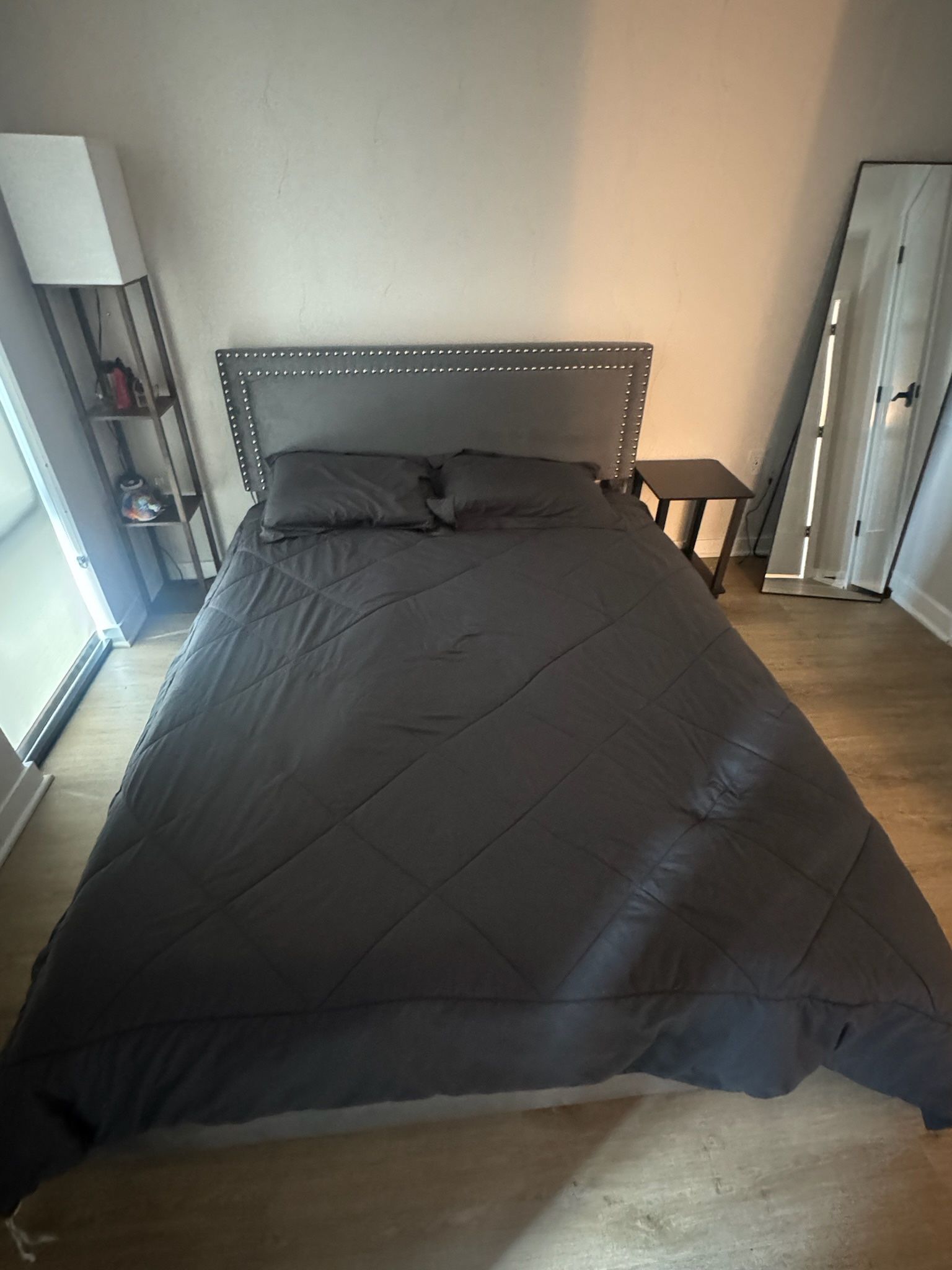 Grey bed frame with drawers