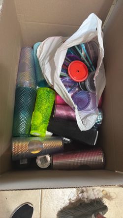 Box full of Starbucks cups