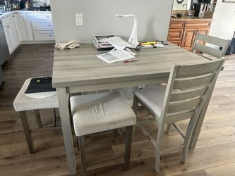 TABLE WITH FOUR CHAIRS INCLUDED