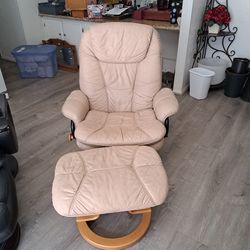 Tan faux leather recliner with ottoman