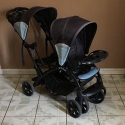 LIKE NEW BABY TREND SEAT AND STAND DOUBLE STROLLER!!!!