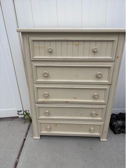 Tall Dresser 38x17x51. Does have some wear on the top and one knob needs a new screw