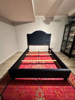 Queen-size upholstered bed