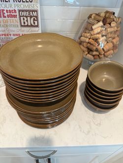 $25 Sur-La table Stoneware Dinner Plates and large Bowls and small bowls.