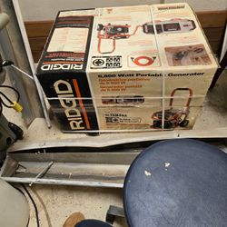 RIDGID 6,800 Watt Portable Generator Model # RD9C6801P