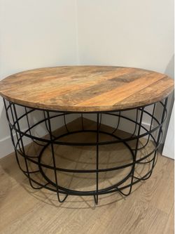 Coffee table with wire basket base
